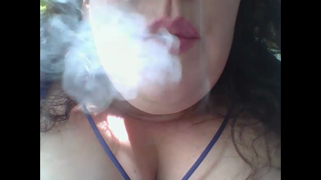 smoking cigar in backyard video from SultryMissEm