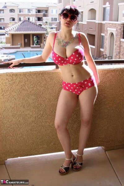 Busty amateur Susy posing in a polka dot bikini Image #3