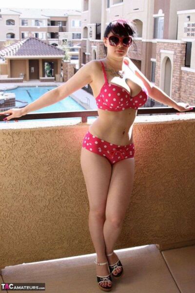 Busty amateur Susy posing in a polka dot bikini Image #4