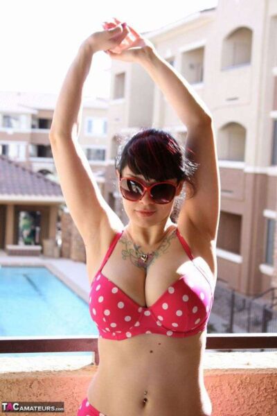 Busty amateur Susy posing in a polka dot bikini Image #8