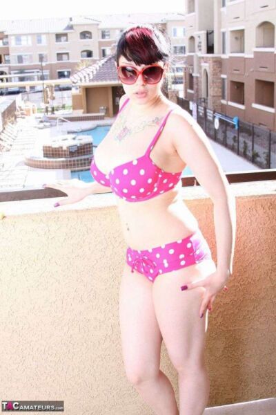 Busty amateur Susy posing in a polka dot bikini Image #12