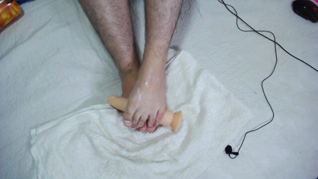 Big dildo footjob video from Infinite Soul