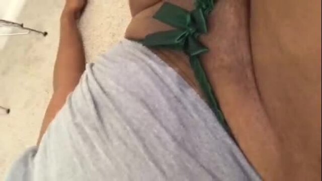 Body Check In A Tank Top And Green Thong
