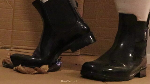 Black shiny rubber boot Banana food crush video from Goddess Kira Secura