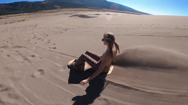 Topless Sand Sledding video