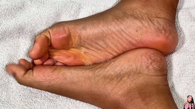 PF Spits on Her Feet for You to Worship video from Pink Foxx
