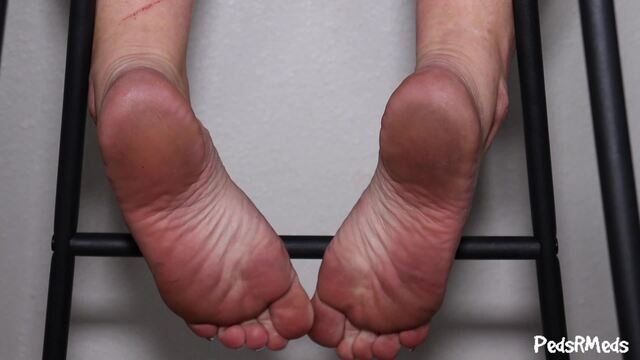 Antoinette Blue Under the Chair Foot Tease video from Pedsrmedsproductions