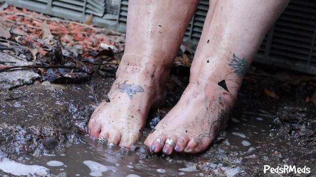 Momma Kat Splashing Her Feet in Muddy Water video from Pedsrmedsproductions